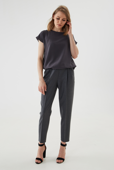 Top made of natural silk with lowered sleeves and elasticated placket.