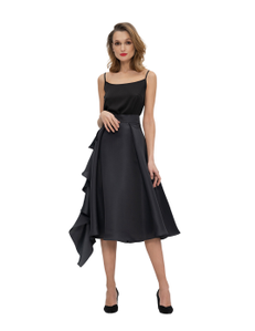 Silk taffeta skirt with large pleats and asymmetrical large flounce at the side seam.