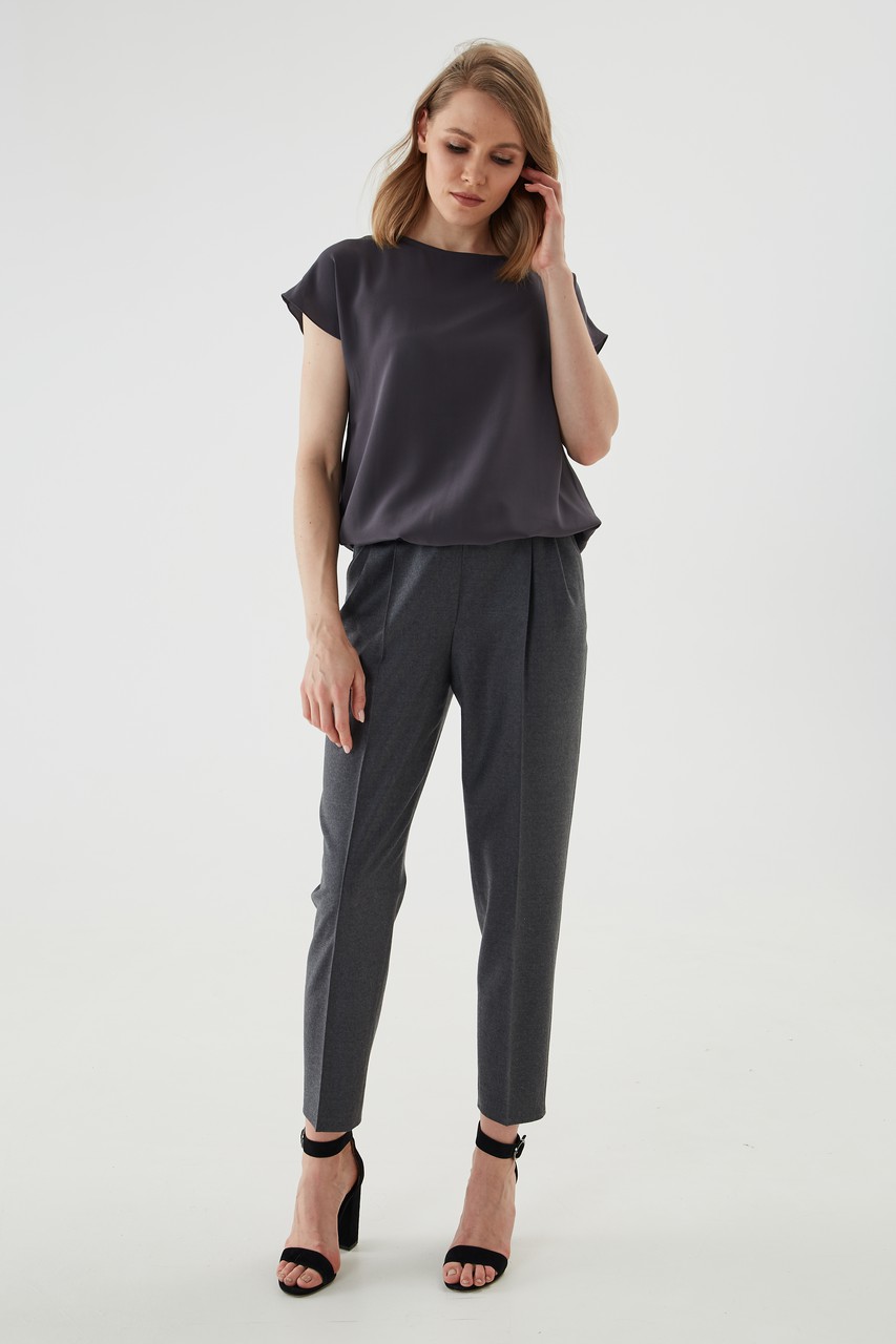 Top made of natural silk with lowered sleeves and elasticated placket.