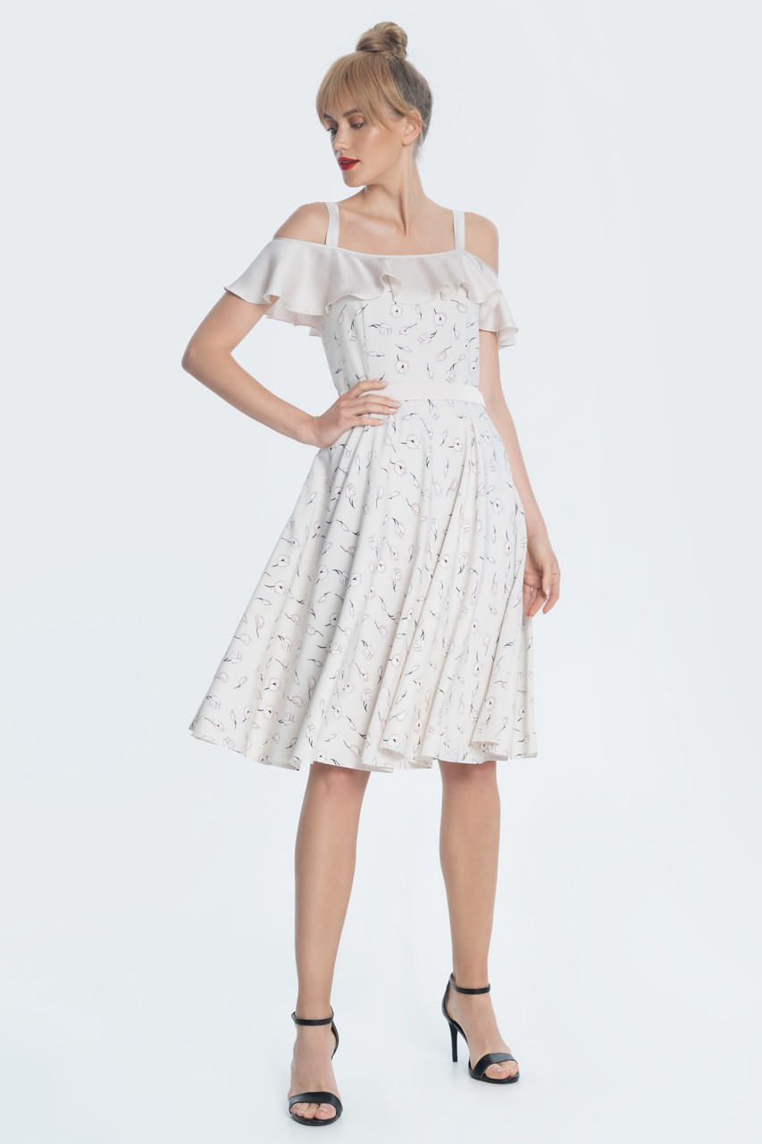 Stylish and romantic dress with the straps of a fitted silhouette with a delicate floral pattern. The line of the chest and shoulders is framed by a flowing satin flounce. Includes a removable white belt.