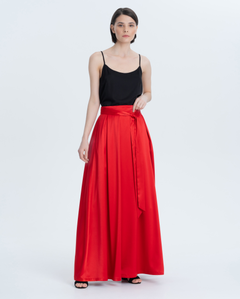 Floor-length satin skirt with original pleats and ribbons-belt. The skirt is not only beautiful, but also comfortable thanks to the metal zip fastening on the back, pockets in the side seams and a thin lining.