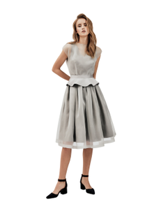 double dress with removable peplum belt. Silk organza top and heavy cotton bottom. fastening with a metal zipper and a button in the center of the back.