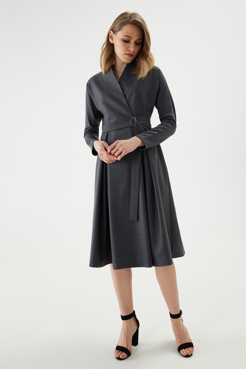 Slim-fit dress made from premium wool suiting. Loose skirt with pintucks at the waist, beautiful neckline and one-piece sleeve make it versatile for any occasion.
