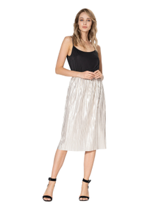 A pleated metallized skirt on a thin lining with a comfortable elastic belt — elastic at the waist.