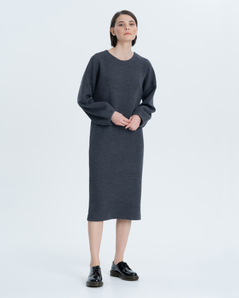 Minimalistic dress made of premium wool Jersey. Soft round neck, pockets in the side seams, comfortable length and original …
