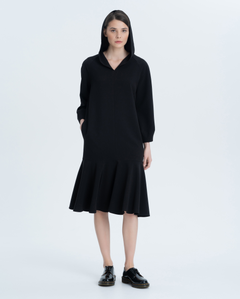 Stylish crepe dress with a hood. A wide flounce at the bottom of the product, pockets in the side seams and the original cut of the sleeve create both a sporty and romantic image.