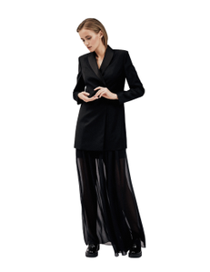 double-breasted tuxedo dress with satin trim. The extra-long double-breasted tuxedo can be worn with trousers, a skirt, or on its own as a short dress.