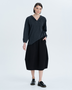 Tunic of a loose silhouette with an original sleeve, hood and small slits in the side seams. Made of soft cotton Italian double-sided jersey. It goes well with skirts, jeans or trousers.