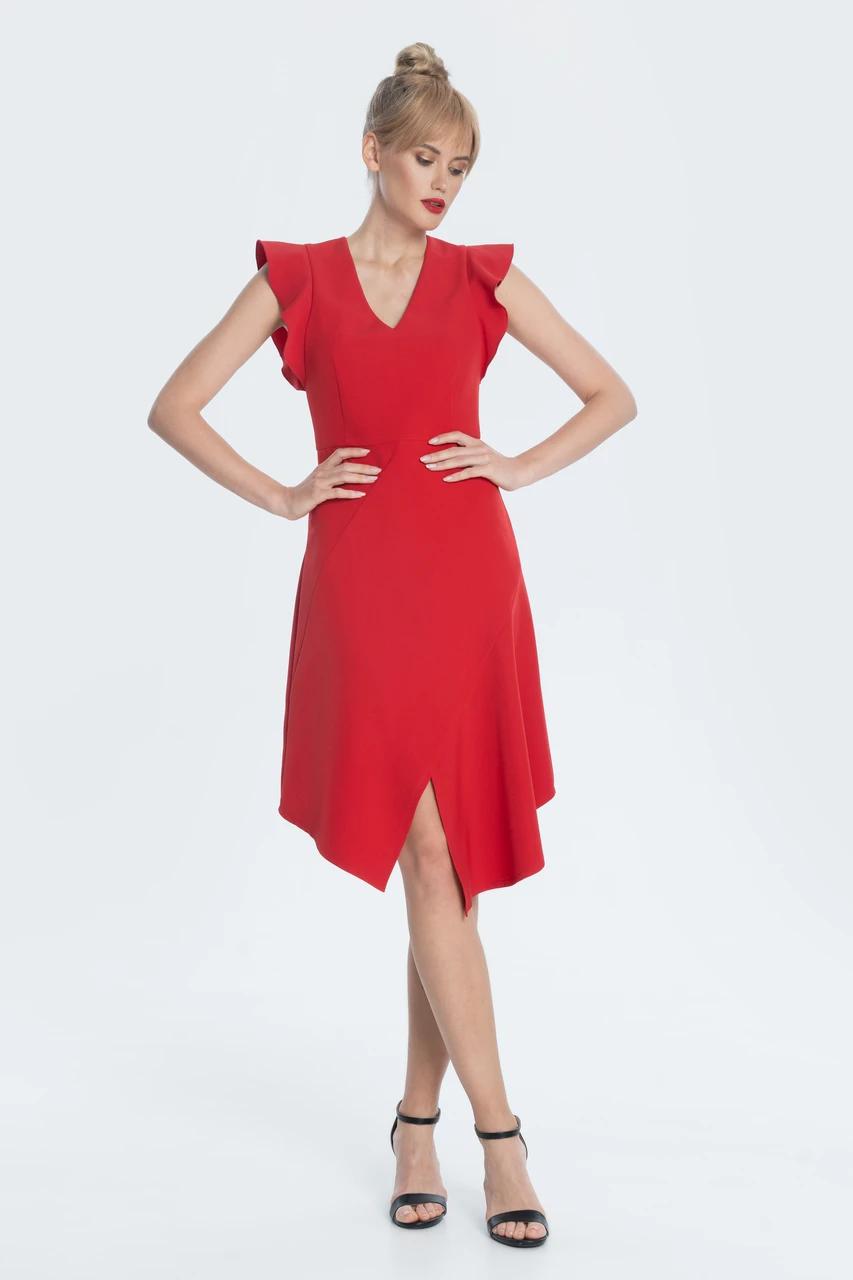 Silhouette dress made of plastic crepe with asymmetrical geometry of the structural lines of the skirt. An additional accent is the original sleeves. Closure along the middle seam of the back with a hidden zipper.